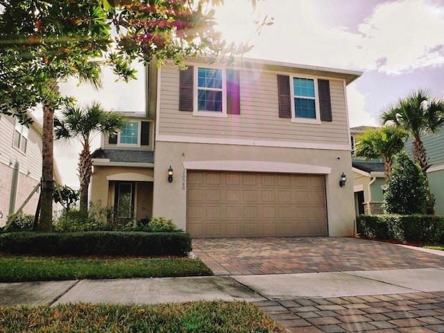 view of front of home with a garage