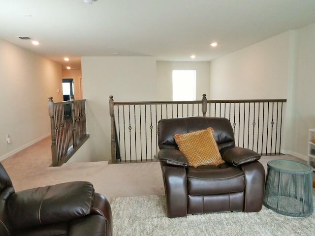 living area with carpet flooring