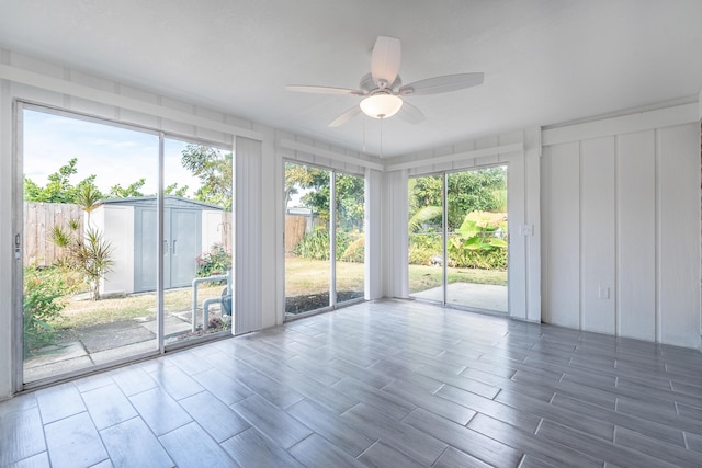 interior space with ceiling fan and a healthy amount of sunlight