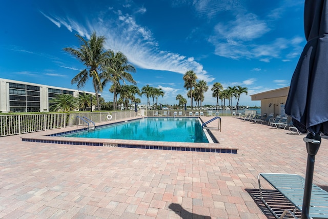 view of swimming pool with a patio