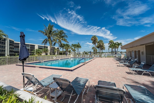 view of swimming pool featuring a patio