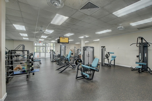 gym featuring a paneled ceiling