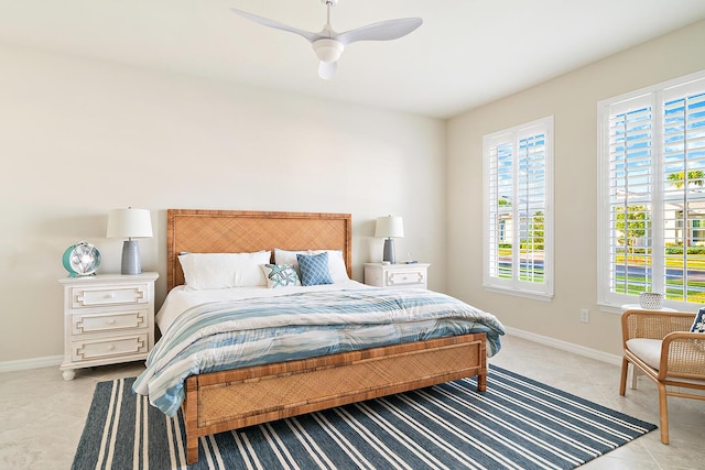 bedroom featuring ceiling fan and light tile patterned flooring