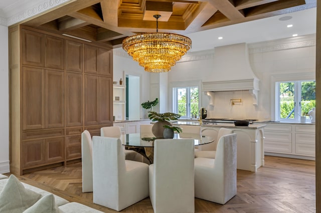 dining room with a chandelier, recessed lighting, coffered ceiling, ornamental molding, and beamed ceiling