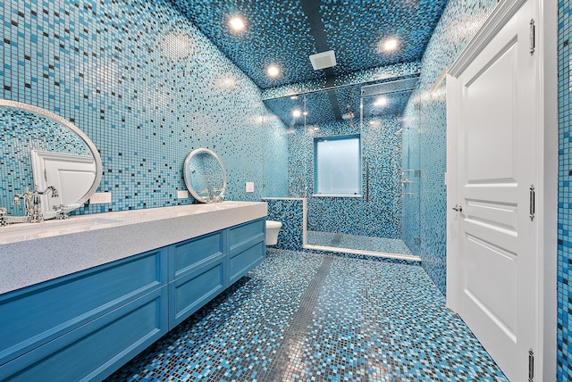 full bathroom with a walk in shower, tile patterned flooring, vanity, and toilet