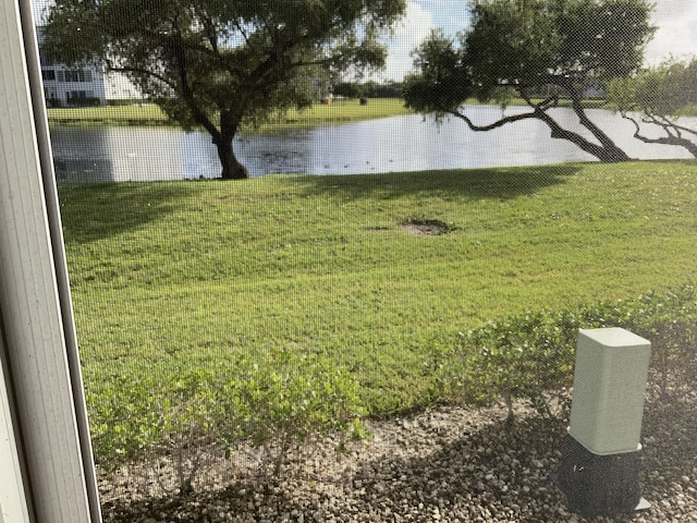 view of yard with a water view