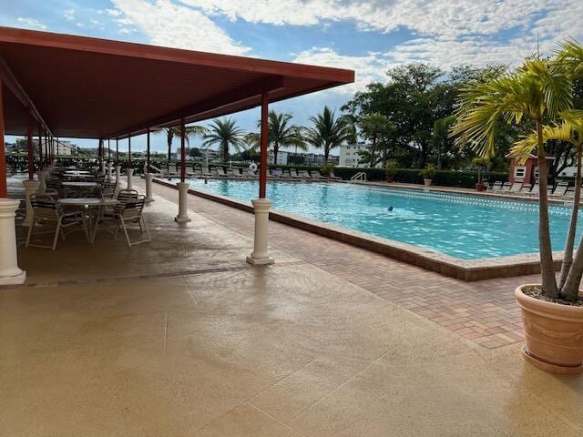1011 Guildford A 1011, Boca Raton, FL 33434 - community pool featuring a patio area