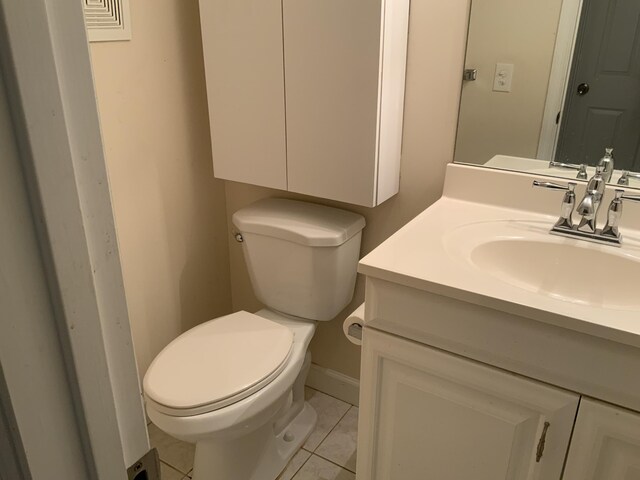 1011 Guildford A 1011, Boca Raton, FL 33434 - half bath featuring vanity and tile patterned floors