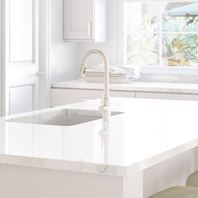 interior details with white cabinets and light stone counters