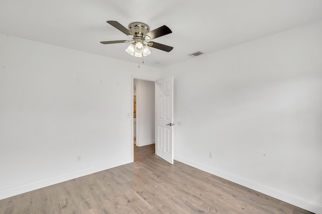 unfurnished room featuring ceiling fan and light hardwood / wood-style floors