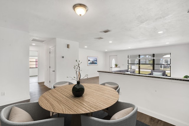 dining room featuring dark hardwood / wood-style floors