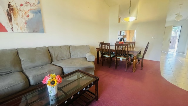 living room with tile patterned flooring