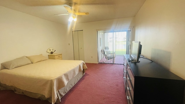 carpeted bedroom featuring ceiling fan, access to outside, and a closet