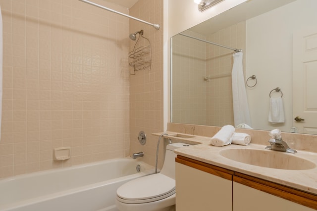 full bathroom featuring vanity, toilet, and shower / bathtub combination with curtain