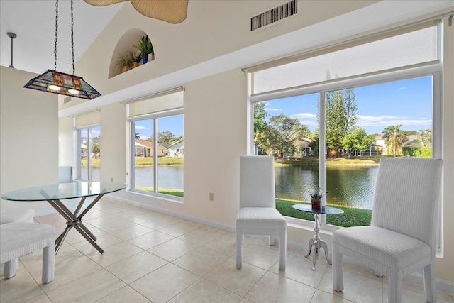 sunroom with a water view