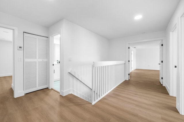 hall featuring light hardwood / wood-style floors