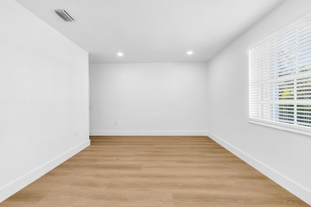 empty room with light wood-type flooring