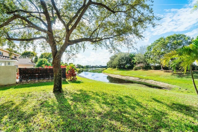 view of yard with a water view