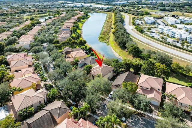 drone / aerial view featuring a water view