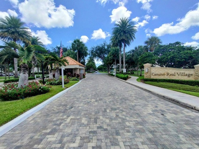 view of road featuring curbs