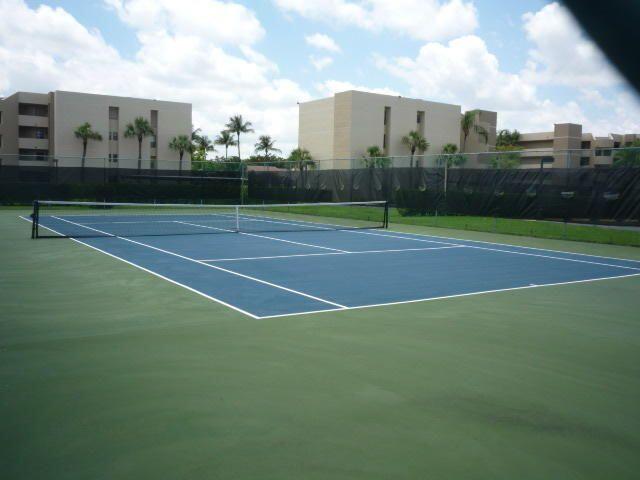 view of sport court with community basketball court and fence