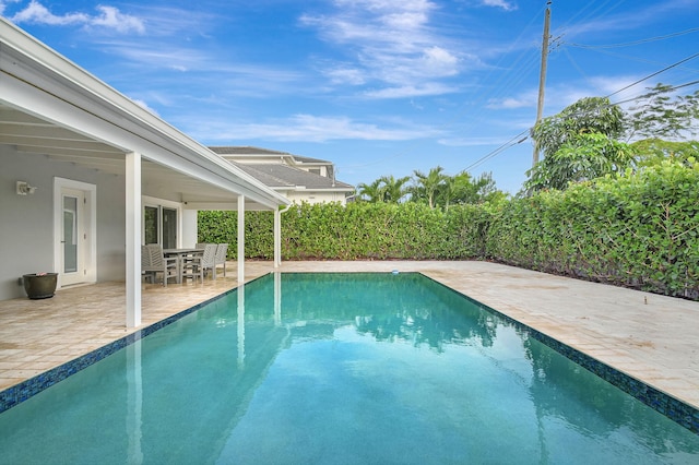 view of pool with a patio area