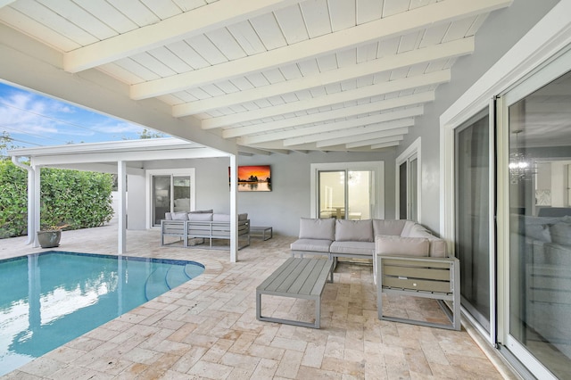 view of swimming pool featuring a patio area and an outdoor hangout area