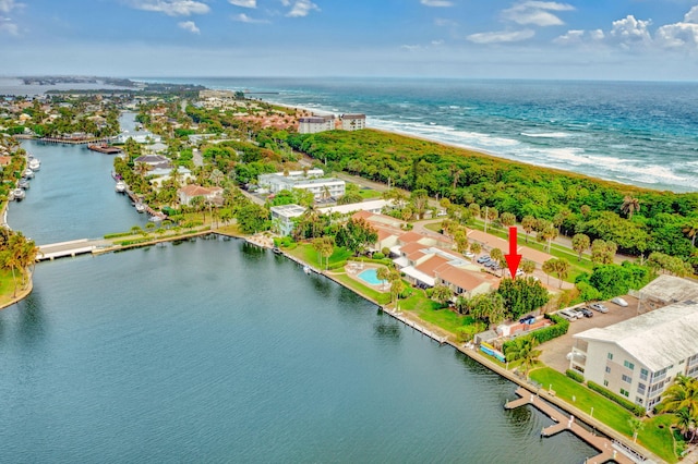 drone / aerial view with a water view