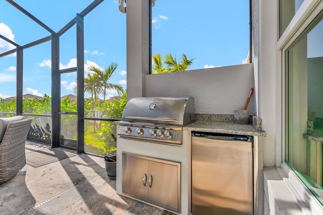 view of patio / terrace with glass enclosure, area for grilling, and grilling area