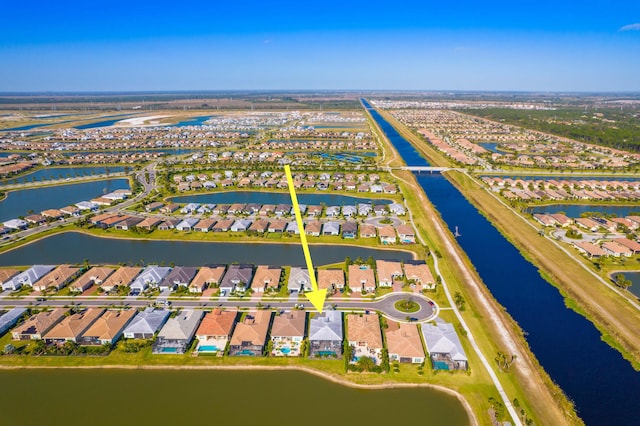 drone / aerial view featuring a water view