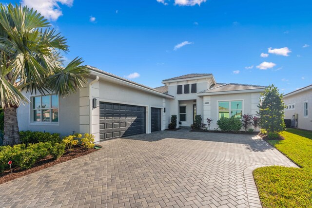 view of front of property with a garage