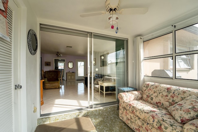 living room featuring ceiling fan