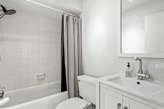 full bathroom featuring vanity, toilet, and shower / bathtub combination with curtain