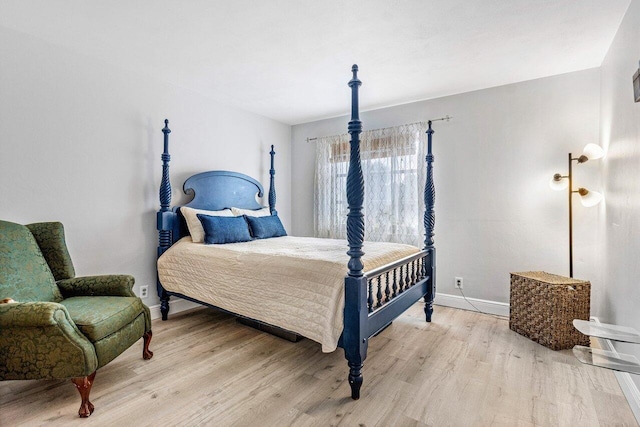 bedroom with light wood-type flooring