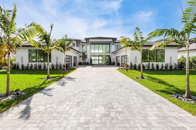 view of front of property with a front lawn