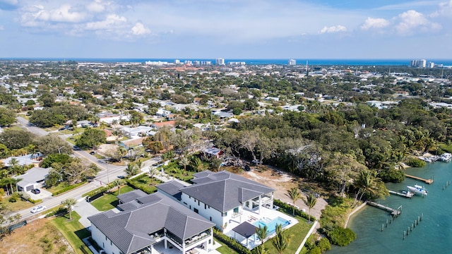 birds eye view of property featuring a water view