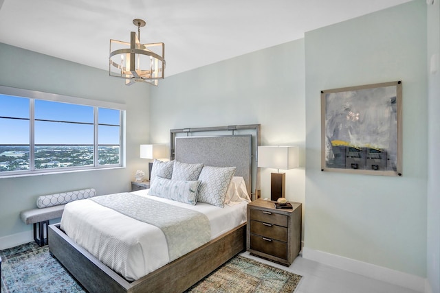 bedroom with a chandelier