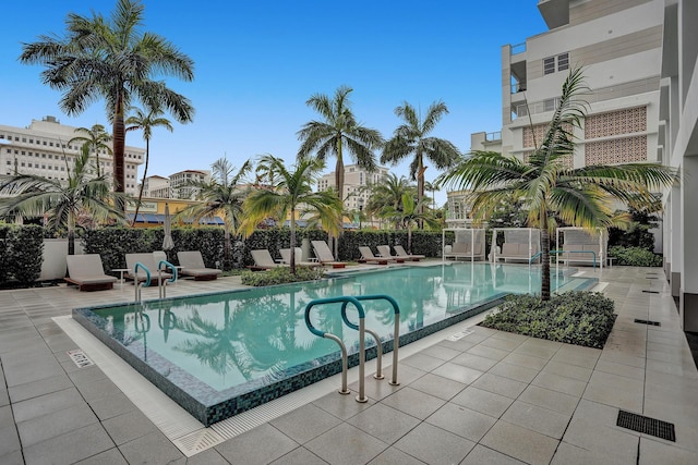 view of swimming pool featuring a patio