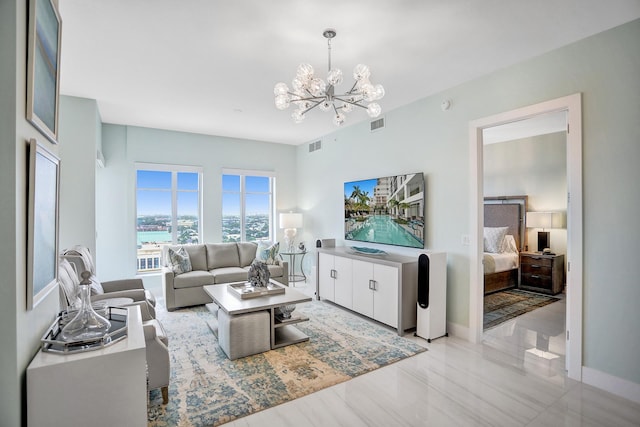 living room featuring a notable chandelier