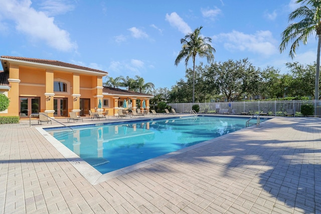 view of swimming pool featuring a patio