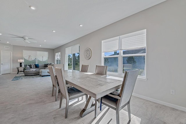 dining room with ceiling fan