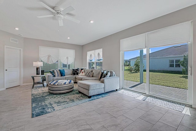 living room with ceiling fan