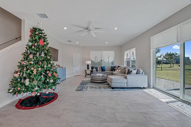 living room featuring ceiling fan