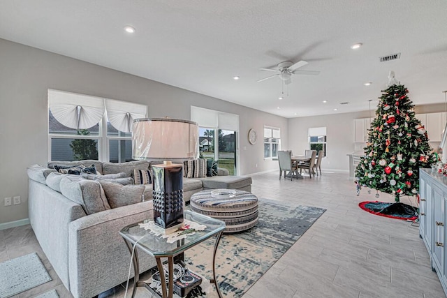 living room featuring ceiling fan