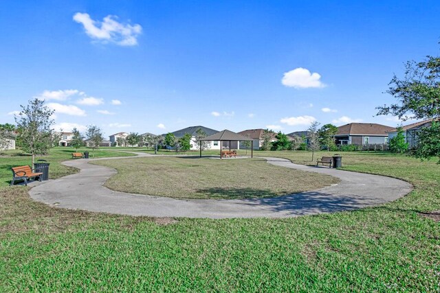 view of property's community featuring a gazebo and a yard