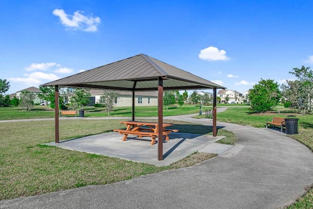 view of home's community featuring a gazebo and a yard