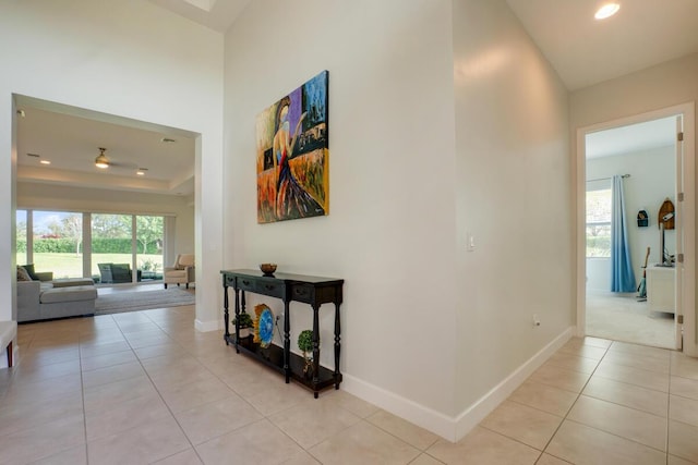 hallway featuring light tile patterned flooring