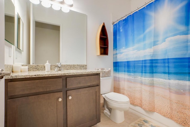 full bathroom with tile patterned floors, vanity, shower / bath combination with curtain, and toilet