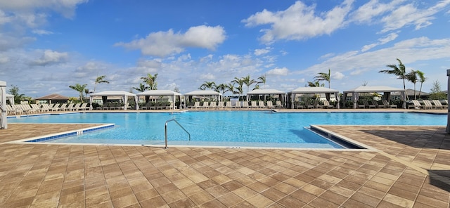 view of swimming pool featuring a gazebo and a patio area