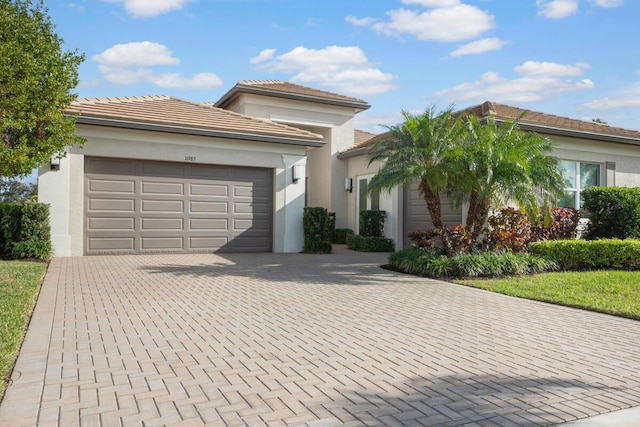 view of front of home with a garage